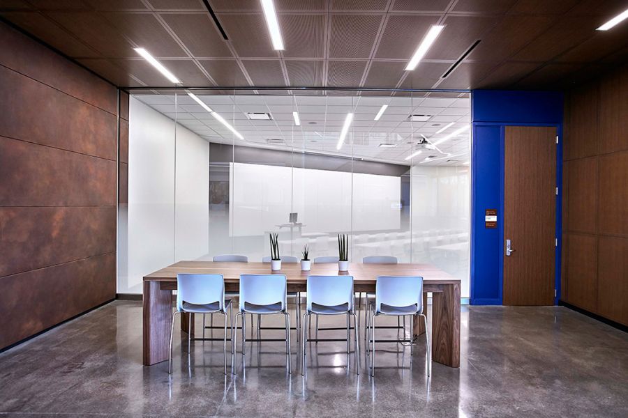 beautiful conference room featuring decorative concrete flooring