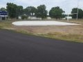 freshly laid asphalt pavement at Wellsville High School track