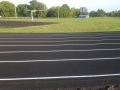 fresh asphalt paving with nice track lines for Wellsville High School Track