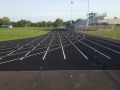 Wellsville High School Track with stadium seats to the right of the track