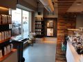 interior of starbucks featuring decorative concrete and wood accents