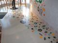 decorative concrete in starbucks with colorful images on the concrete