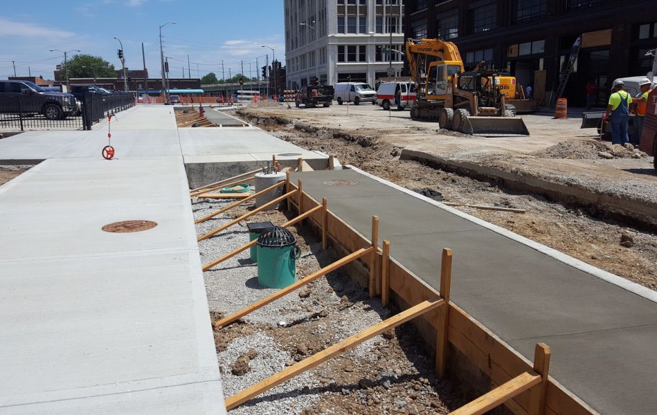 sidewalk being poured near 20th street in the Crossroads District