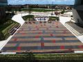 whole view of the Lenexa Civic Center outdoor seating area featuring beautifully designed decorative concrete