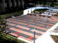 Lenexa civic center with decorative concrete outside of the building featuring red and blue