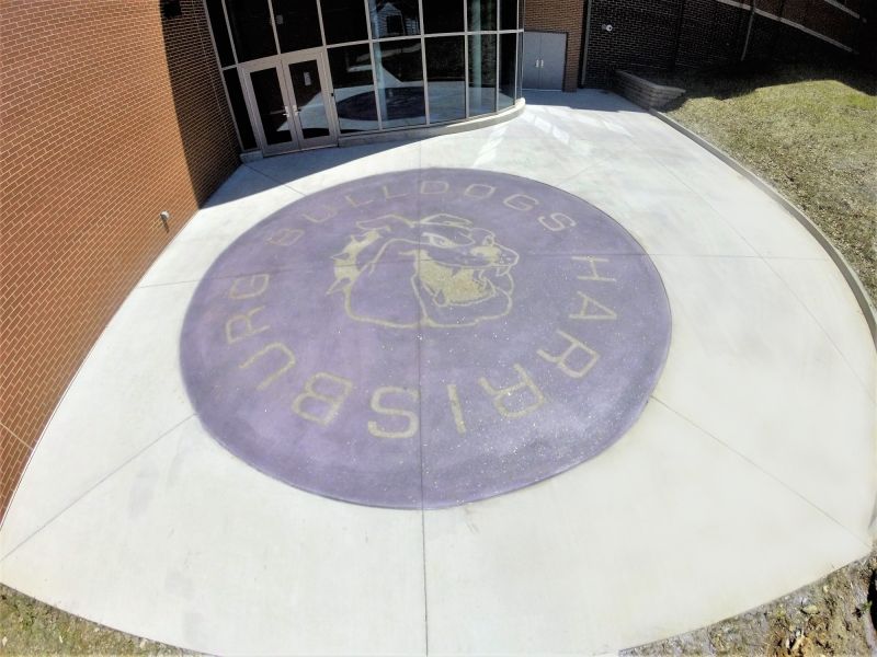 Harrisburg High School decorative concrete mascot in front of the building