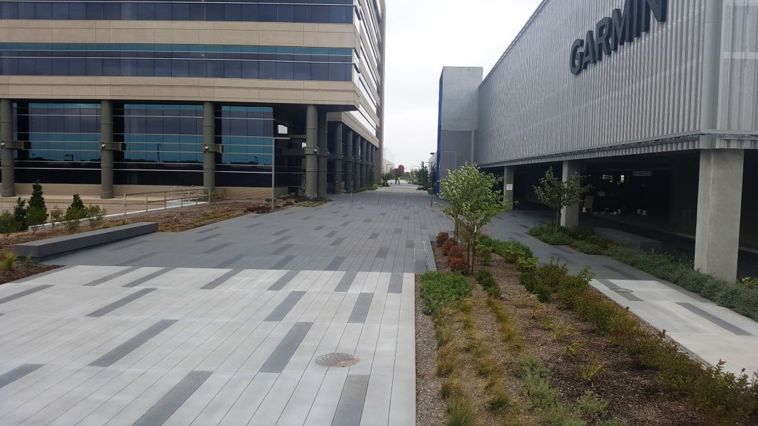 new decorative concrete sidewalk outside of Garmin