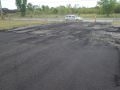 starting the process of paving asphalt near the main entrance for the track