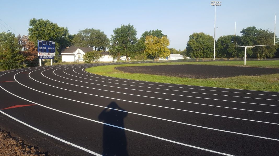 Wellsville High School Track made of asphalt paving and white painted lines