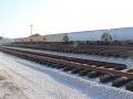 brand new railroad tracks on big logs near the A&M Pet Supply Manufacturing Plant