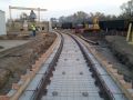 railroad contractors laying a new railroad construction
