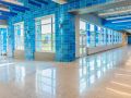 grain valley high school blue hallway concrete